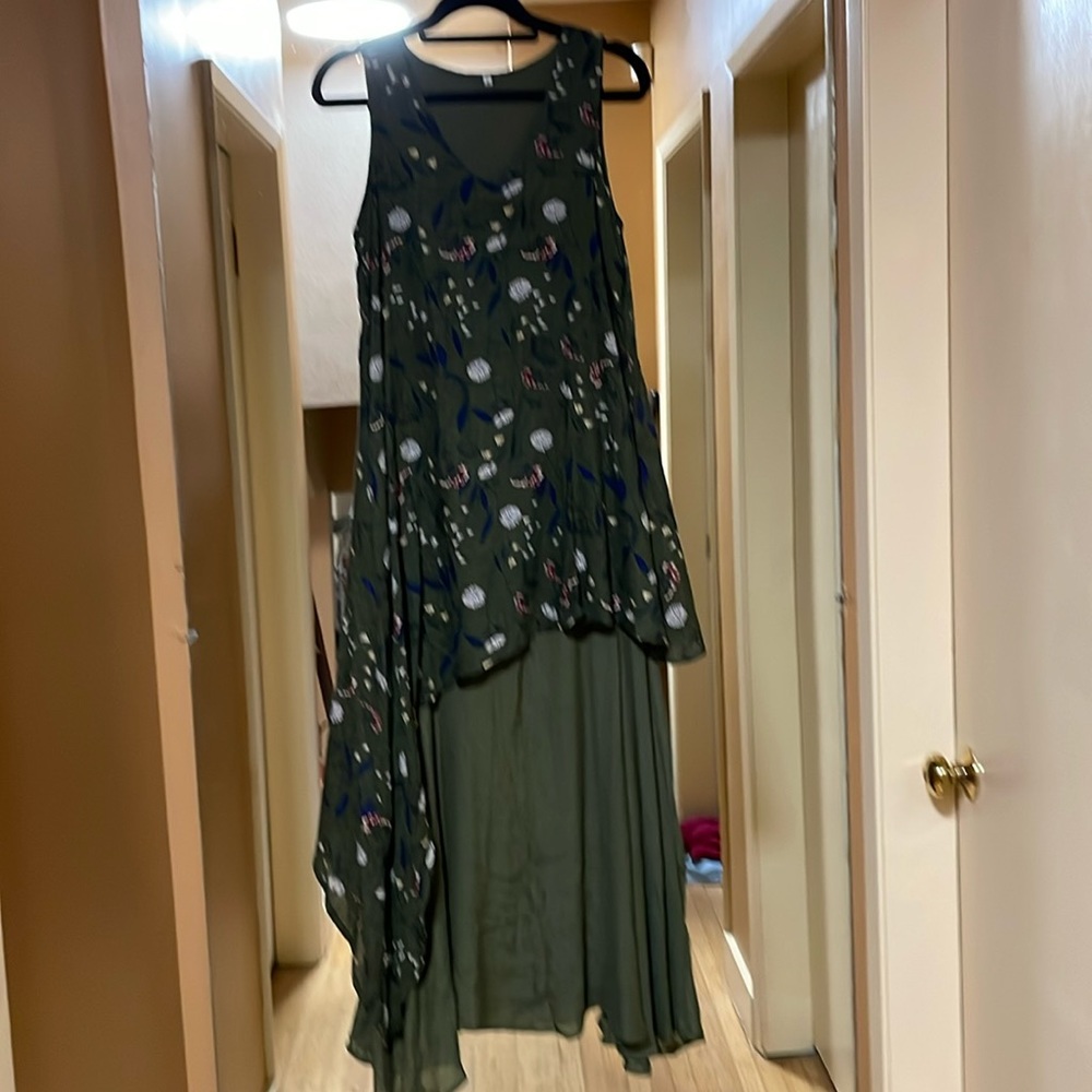 Sleeveless maxi dress, new, green floral with green plain material.